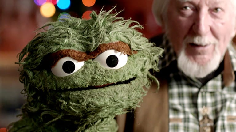 Puppeteer Caroll Spinney poses with one of this iconic characters, Oscar the Grouch, in the documentary 'Street Gang: How We Got to Sesame Street' LUKE GEISSBUHLER / COURTESY OF SUNDANCE INSTITUTE